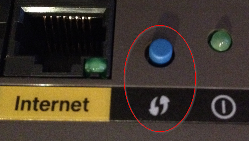 Przycisk WPS na routerze