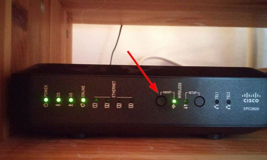 Przycisk Wireless na routerze